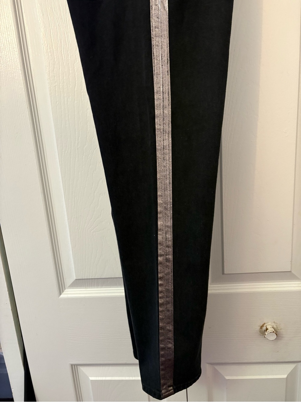 J Brand sleek cropped jeans. High-rise waist, tapered leg metallic silver stripe